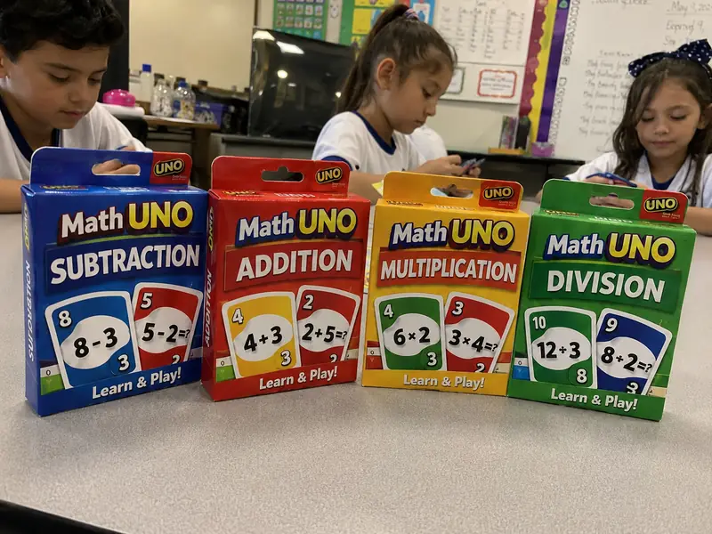 Parents and teachers playing Math UNO 3